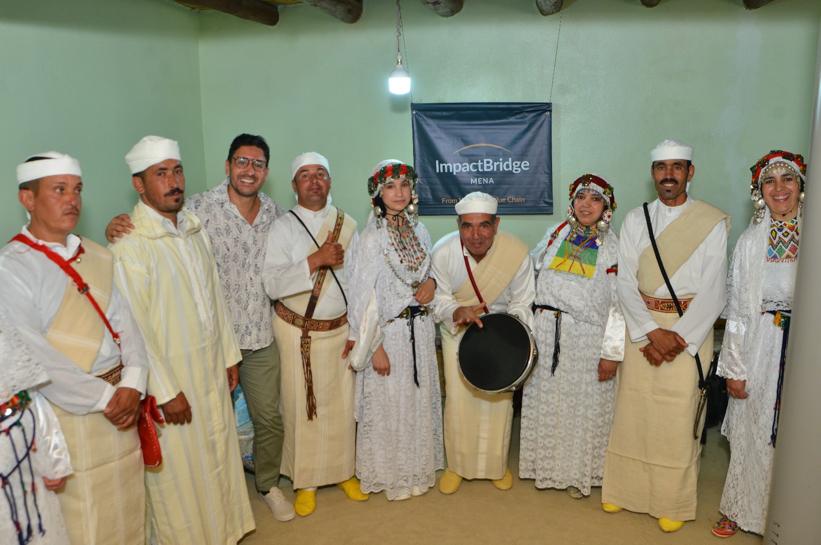 Coop Iloukah, Taza: members in traditional dress with the ImpactBridge MENA team