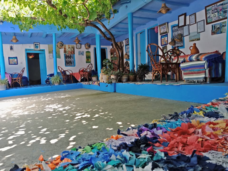 Community Impact 4 Ferme Dar Aicha, Chefchaouen: courtyard with hand-dyed wool drying in the sun